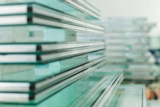 Sheets of Tempered Window Glass Sheets of Factory manufacturing tempered clear float glass panels cut to size glass panel exterior door stock pictures, royalty-free photos & images