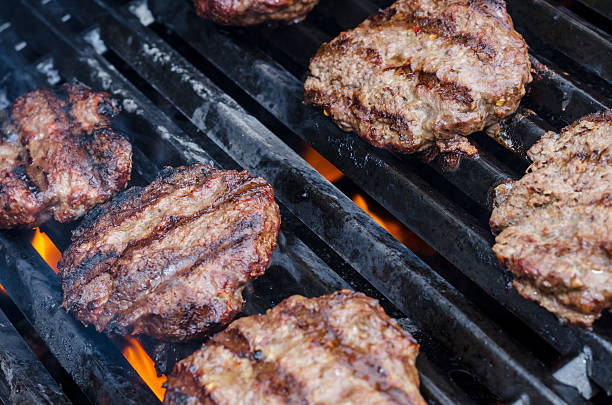 istock Burgers on the grill 486466682