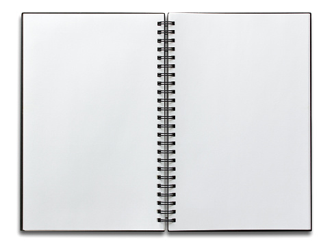 Abrir cuaderno con espiral blanca aislado photo