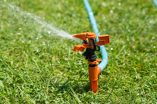 istock garden sprinkler spraying water 486468610