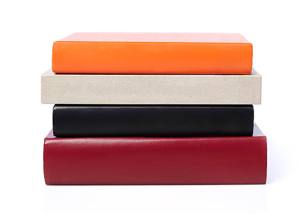 Stack of books Multi-colored stack of books, white background book spine book stack blank stock pictures, royalty-free photos & images