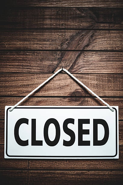 istock door closed store sign on a plank wood 486469659
