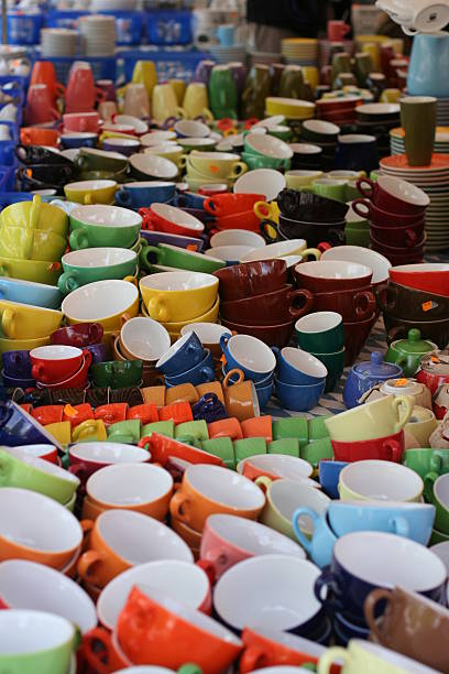 Cups and other tableware on a market stock photo
