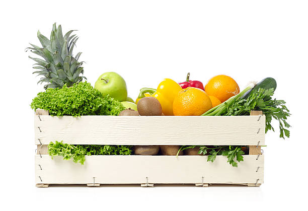 istock Fruits and vegetables on wooden crane 486473200