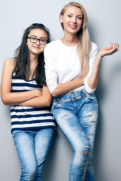 istock Fashionable young girls posing. 486473380