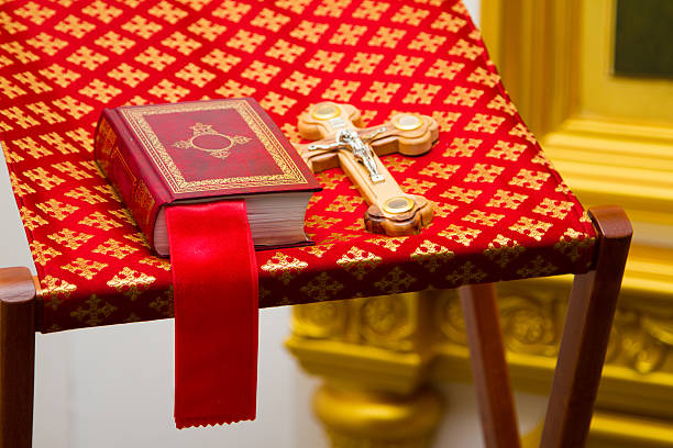 istock Holy Bible and Orthodox cross 486473663