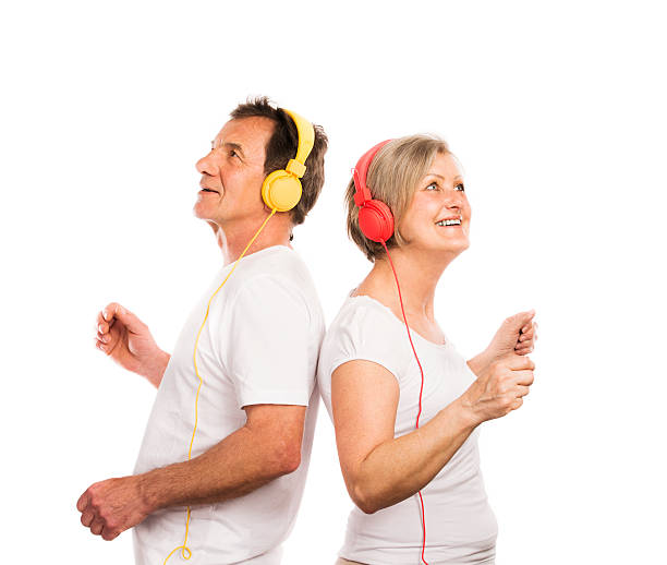 istock Senior couple with headphones 486473929
