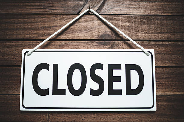 istock door closed store sign on a plank wood 486474857