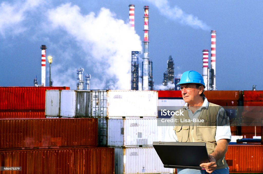 Engineer in Chemical Plant Worker in Chemical Plant . Laptop Stock Photo