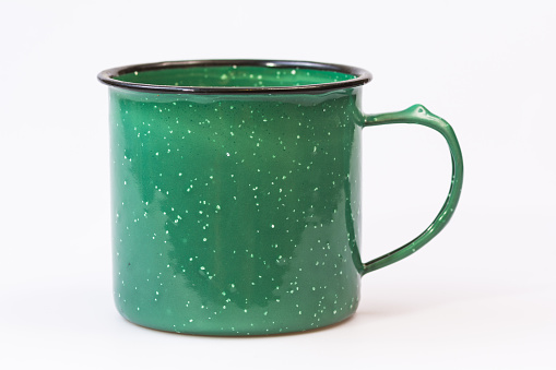 Green granite style coffee mug on white