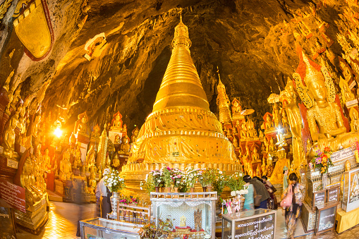 Golden Buddha statues in Pindaya Cave located next to the town of Pindaya, Shan State, Burma,Myanmar, are a Buddhist pilgrimage site and a tourist attraction.