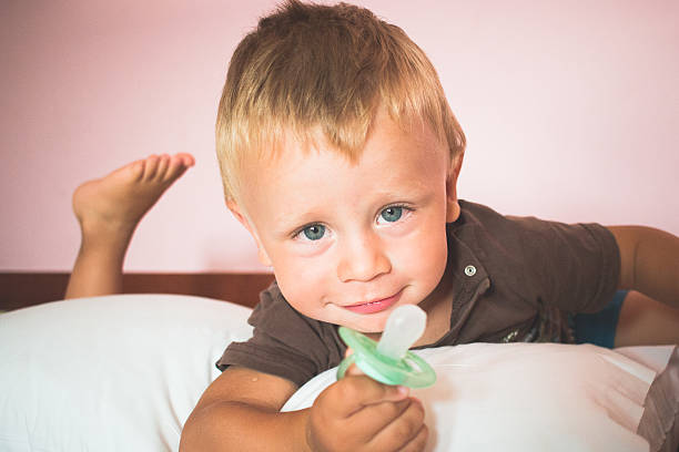 Boy With Pacifier stock photo
