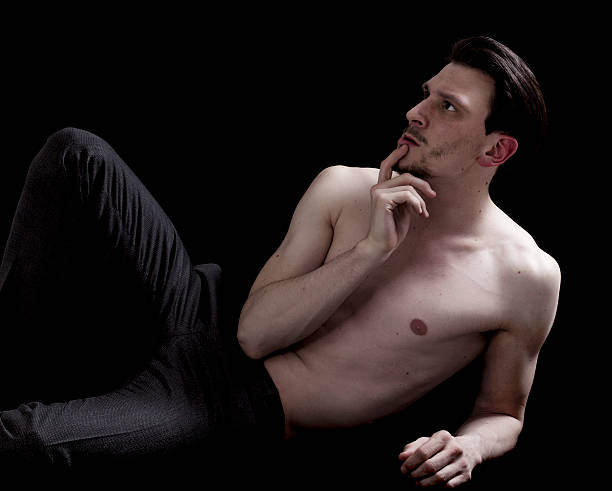 istock Handsome and thoughtful bare-chested man portrait 486481474