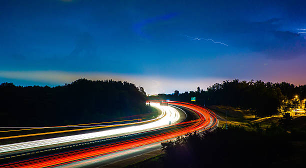 istock thunder and lightning storm weather during evening traffic commu 486484668