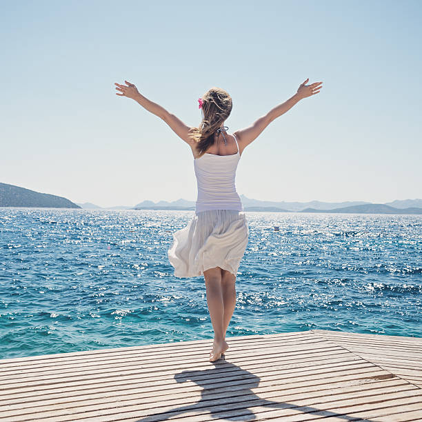 istock Woman at the sea 486489494
