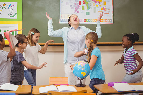 istock Pupils running wild in classroom 486489642