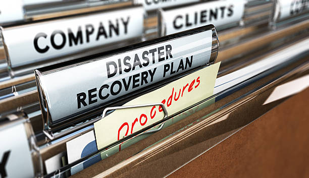 DRP, Disaster Recovery Plan Close up on a file tab with the text Distaster Recovery Plan, focus on the main text and blur effect. Concept image for illustration of DRP ans crisis communication. disaster stock pictures, royalty-free photos & images
