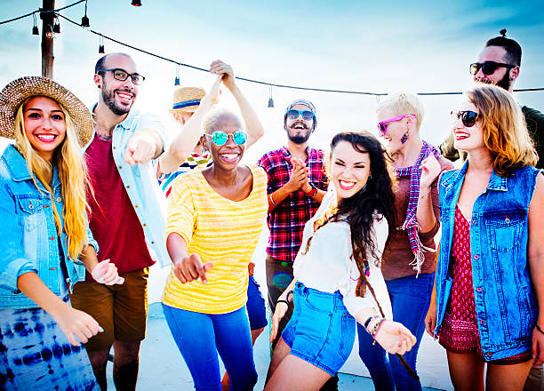istock Friendship Dancing Bonding Beach Happiness Joyful Concept 486491022