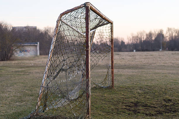 istock Old rusty soccer goal on sunset, nostalgia concept 486495452