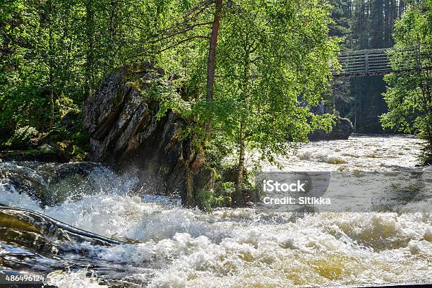 River And Hanging Bridge Stock Photo - Download Image Now - 2015, Adventure, Beauty In Nature