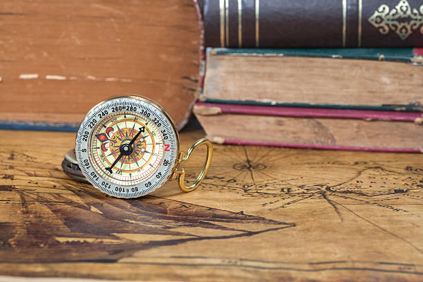 istock Vintage compass lies on an ancient map 486499742