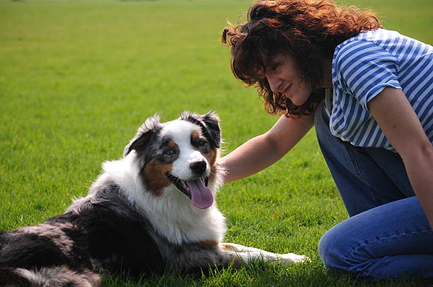 istock Young woman loves her dog 486502441