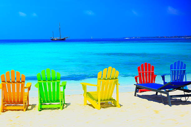 istock Have a seat: Caribbean paradise, turquoise beach, chairs, ship – Antilles 486502708
