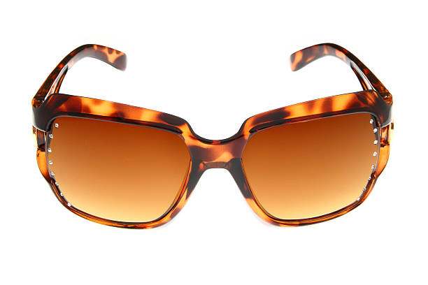 istock isolated fashion Brown sunglasses on white background 486503521