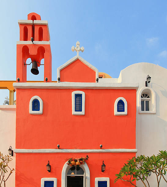istock Beautiful Cross and orange building with blue sky , white clou 486503611