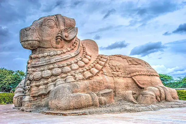 HDR image of sculpture of bull named Nandi at Lepakshi, Andhra Pradesh, India. This is the largest in India and this is carved out of huge rock bounder.