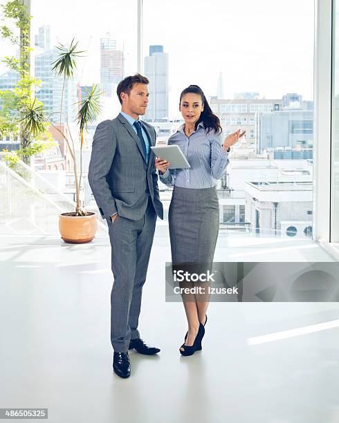 Business Couple Stock Photo - Download Image Now - Real Estate Agent, Luxury, Real Estate
