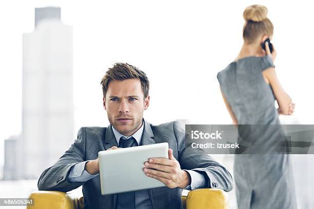 Businessman With Digital Tablet Stock Photo - Download Image Now - 20-24 Years, Adult, Adults Only