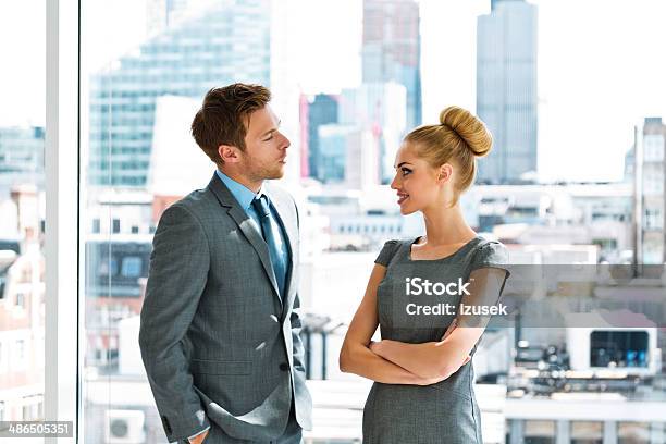 Business Couple Stock Photo - Download Image Now - Business, Penthouse, 20-24 Years