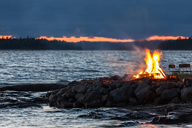 istock Summer Campfire and Lake at Sunset 486505402