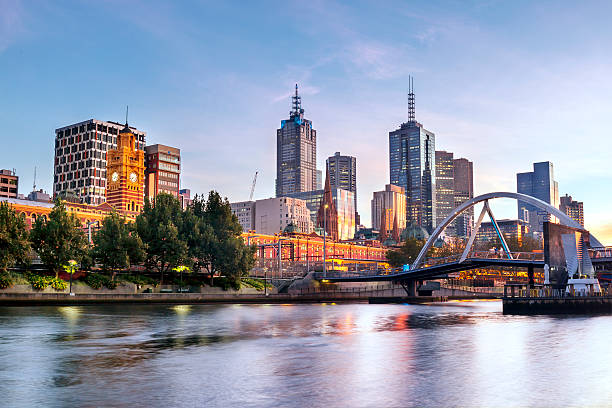 Melbourne Morning Melbourne, Australia, in early morning light.  Yarra River, towards Flinders Street Station. melbourne australia stock pictures, royalty-free photos & images