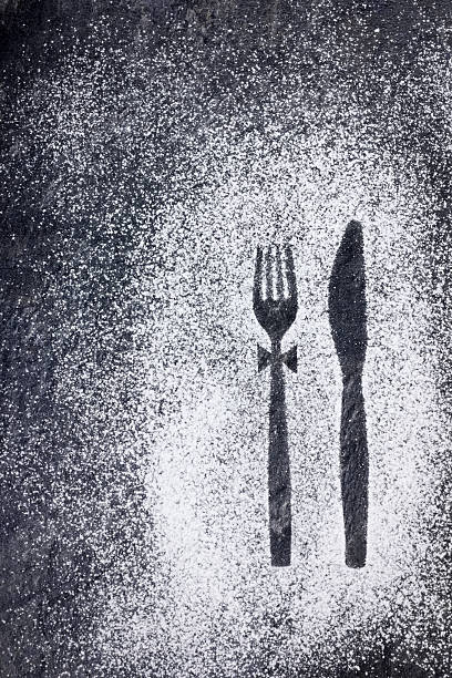 istock Knife and fork imprint in powdered sugar 486506853