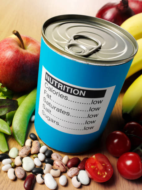 Nutrition Label on a Tin Can with Fresh Fruit