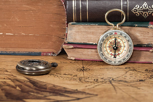 istock Vintage compass lies on an ancient map 486508122