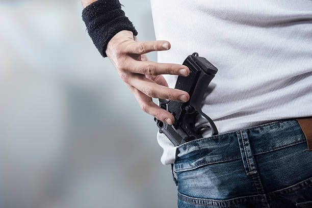 istock Man grabbing his pistol 486508472