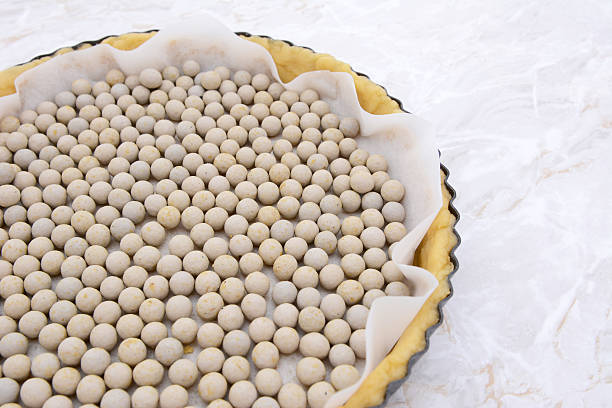 Pastry weights in an unbaked pie case