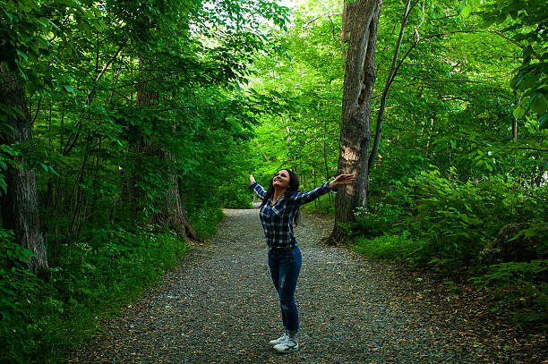 istock Woman, her face upward, enjoying nature 486512532