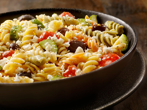 Greek Pasta Salad With Fusilli, Tomatoes,Cucumbers, Black Olives and Feta in an Oil and Vinegar Dressing,  -Photographed on Hasselblad H3D2-39mb Camera