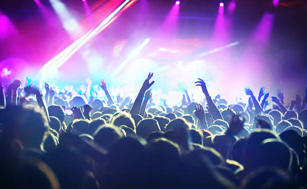istock People at concert party. 486517238