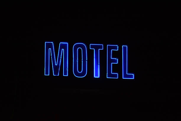 istock Neon Sign with the word Motel. 486521036