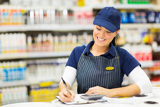 istock store clerk writing stock 486521040
