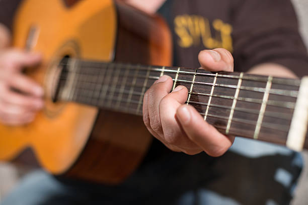 istock Guitarist in the street 486521275