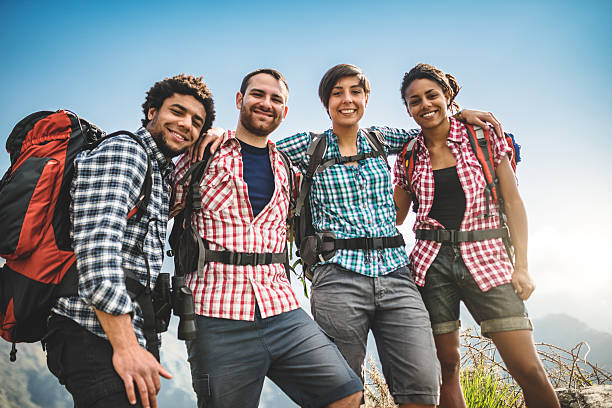 istock group of people standing on the mountain happiness 486521977