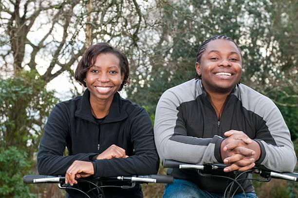 istock Active African American Couple On Their Bikes In The Park 486522201