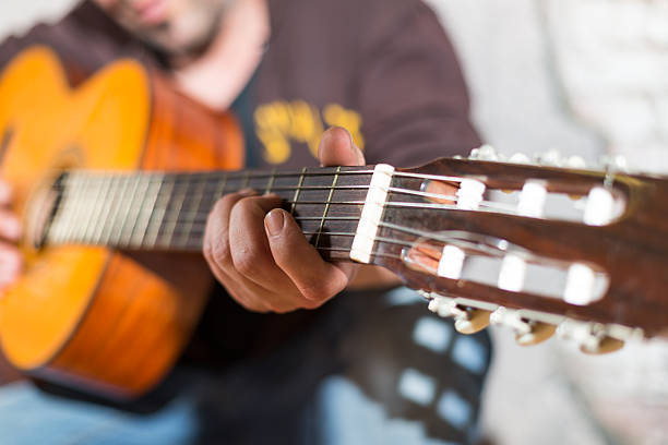 istock Guitarist in the street 486522211