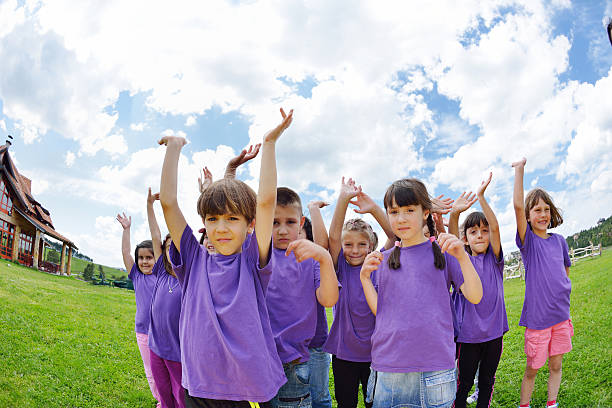 istock happy kids group  have fun in nature 486522261